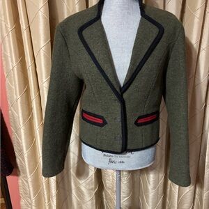 Vintage early 70’s military Olive Green Women's Jacket with Black and red Trim.